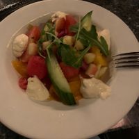 Heirloom tomato, watermelon, cucumber salad (with dollop of yumminess)  at Disneyland - Blue Bayou in Anaheim