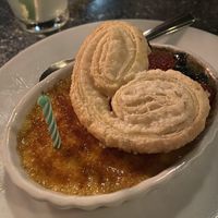 Creme brûlée was amazing and they even added a birthday candle 🥹  at Disneyland - Blue Bayou in Anaheim