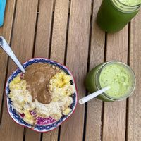 During fruit bowl. With green juice. Yummy at Under the Mango Tree in Miami Beach