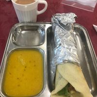 Wrap comes with a small side of dhal
 at Thenga Cafe in London