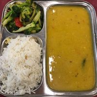 Daily lunch - rice, dhal and stir fry broccoli  at Thenga Cafe in London
