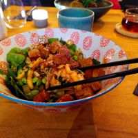 Teriyaki Tofu Bowl with rice noodles, edamame, kimchi, koriander, spinach, and sesame  at Zwei und Zwanzig in Geisenheim