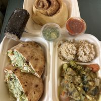 musubi, cinnamon roll, green curry and pita falafel  at Umeke Market in Honolulu