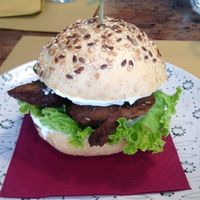 Vegan Burger was delicious. Seasoned seitan meat, really good mayo, zucchini and lettuce. Nice bun too! All organic. at Dulcamara Bio Vegan Bistrot in Verona