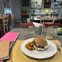 Vegan burger with potatoes😄 at Dulcamara Bio Vegan Bistrot in Verona