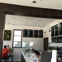 Wall menu by counter where goi cuon are made at Magasin in New Orleans