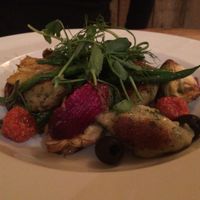 Herb Gnocchi with garlic green beans, caramelised red onion, artichoke, olives and slow roasted tomato.  Another fav.  at Earth and Stars in Brighton