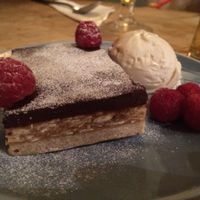 Millionaire shortbread with coconut, almonds served with a side of salted caramel and vanilla ice cream.  Our favorite of the night. at Earth and Stars in Brighton