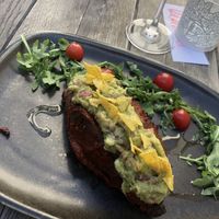 Pečené batáty plněné guacamole at Vegan's Prague in Prague