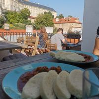 vegan goulash and the small balcony at Vegan's Prague in Prague