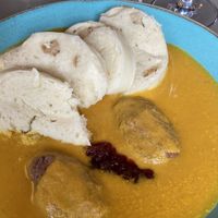 Tempeh in root veg sauce with dumplings   at Vegan's Prague in Prague