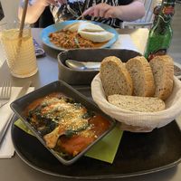 Lasagne with homemade bread and goulash with dumplings.  at Vegan's Prague in Prague