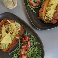 Baked sweet potato and homemade lemonade   at Vegan's Prague in Prague