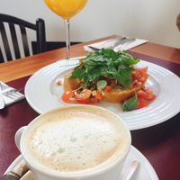 tomato bruschetta soy capuchino at Vegan's Prague in Prague