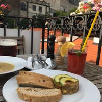 View on the Castle, avocado tartare, cauliflower soul, ice tea, beer at Vegan's Prague in Prague