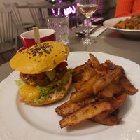 Special burger, mango, jalapeños, and great potato wedges at Vegan's Prague in Prague
