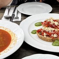 Soup and bruschetta. Passionfruit spritz and lemonade   at Vegan's Prague in Prague