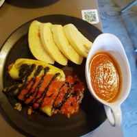 Another Czech classic, filled peppers with a tomato sauce and dumplings. This along with svickova are big recommendations! at Vegan's Prague in Prague