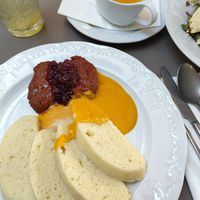 Traditional dumplings with special sauce and "steak" at Vegan's Prague in Prague