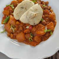 Vegetable goulash with traditional dumpling at Vegan's Prague in Prague