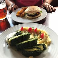 Burger and daily special spinach rolls at Vegan's Prague in Prague