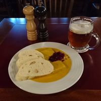 Svíčková with dumplings, smoked tempeh and cranberry jam together with Vinohradska pivo at Vegan's Prague in Prague