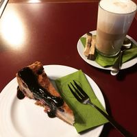 The thinnest slice of cake for far too much money and cold coffee! at Vegan's Prague in Prague