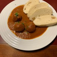 Quinoa balls in tomato sauce with local dumplings  at Vegan's Prague in Prague