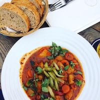 Vegan goulash with fresh baked bread  at Vegan's Prague in Prague