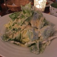 Caesar salad with vegan parmasan cheese at Vegan's Prague in Prague