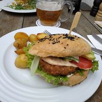 Burger with potatoes !!  at Vegan's Prague in Prague
