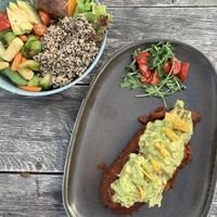 sweet potato w/ guac and buddha bowl at Vegan's Prague in Prague