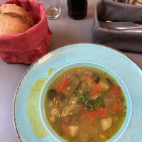 Soup with housebaked bread  at Vegan's Prague in Prague