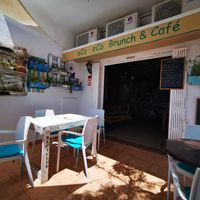 Courtyard seating area covered by beautiful trees at Eco Eco in Tenerife