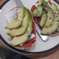 Tomato, avocado and vegan cheese toast at Ofelia Bakery in Sevilla