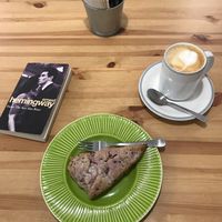 Vegan scone & almond milk latte at Ofelia Bakery in Sevilla