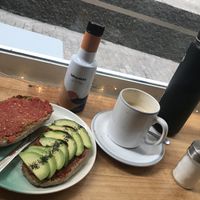 The chai and toast with tomato and avocado  at Ofelia Bakery in Sevilla