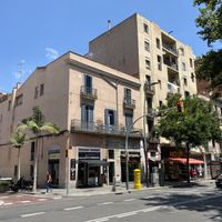 The bakery is in the pink building. at Crois-Sants in Barcelona