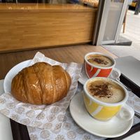 Chocolate croissant and coffees. at Crois-Sants in Barcelona