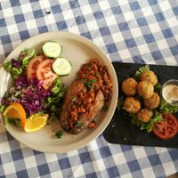 Breaded mushrooms & BBQ baked jacket potato with baked beans at O Forno in Calheta
