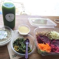 raw beetrot burger, kale chips, raw hummus, green juice. at Vegan & Raw in Mallorca
