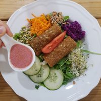 Salad and raw onion bread rolls at Vegan & Raw in Mallorca