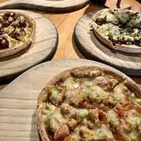 Burger pizza (left), mischief (top), damned (right), brimstone (bottom)  at Hell Pizza in Queenstown