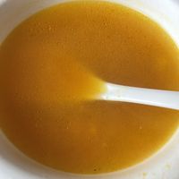 Pumpkin soup   at Jù Cái Sù Diàn in Tibet