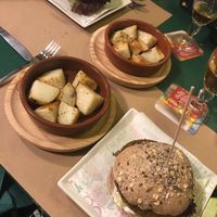 Falafel burger and pizza Burger with potatoes.  at Fuori di Zucca in Tenerife