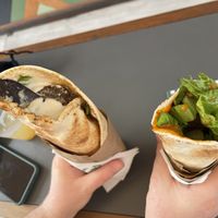 Giant original and small volcano at FalafeLand in Santorini