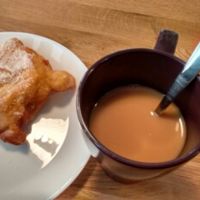 sweet bun & oat milk coffee at Cafe & Bakery Mimosa in Tampere