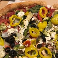 loaded vegan pizza with tofu and daiya cheese  at Mellow Mushroom in Sanford