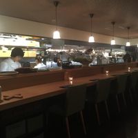 Chefs at work at counter at Ukishima Garden in Kyoto