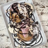 Sharing Dessert. This wasn’t on the menu, we just asked for a dessert to share. It had donuts, ice cream, cream marshmallows, chocolate sauce and Oreos at Voltaire in Bangor